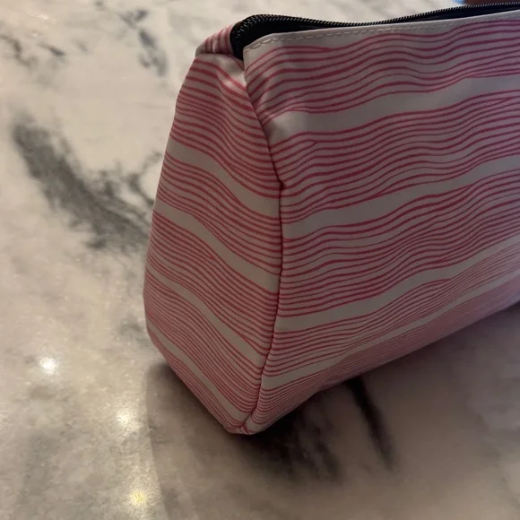 SCOUT Packin' Heat Makeup Bag featuring a pink and white wavy stripe pattern. - Picture 8 of 15